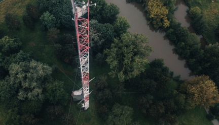 Picture of the Saclay atmospheric observation station from above in a green landscape 